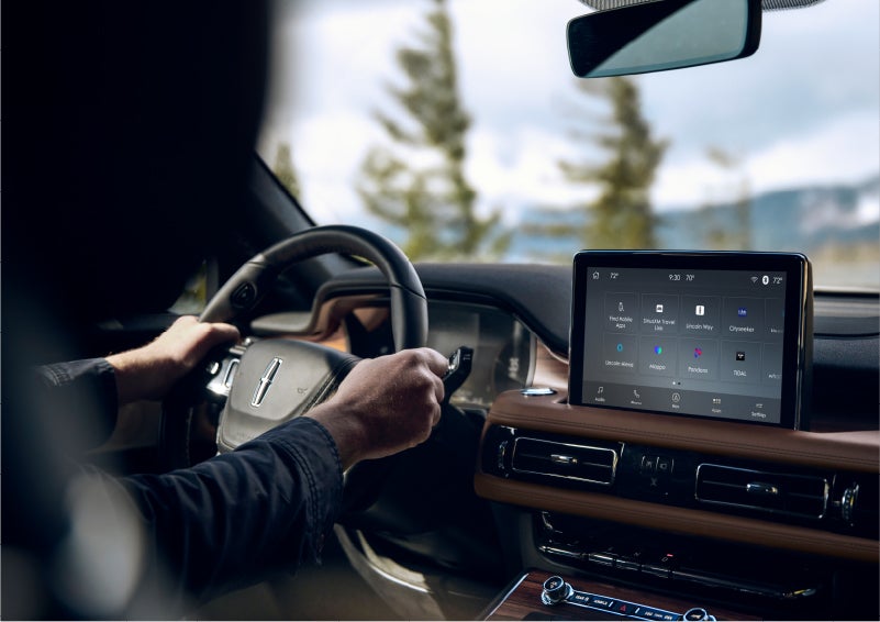 The Lincoln+Alexa app screen is displayed in the center screen of a 2023 Lincoln Aviator® Grand Touring SUV | Hooks Lincoln in Fort Worth TX