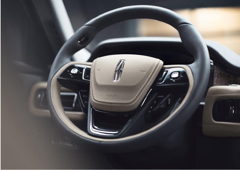 The intuitively placed controls of the steering wheel on a 2023 Lincoln Aviator® SUV | Hooks Lincoln in Fort Worth TX