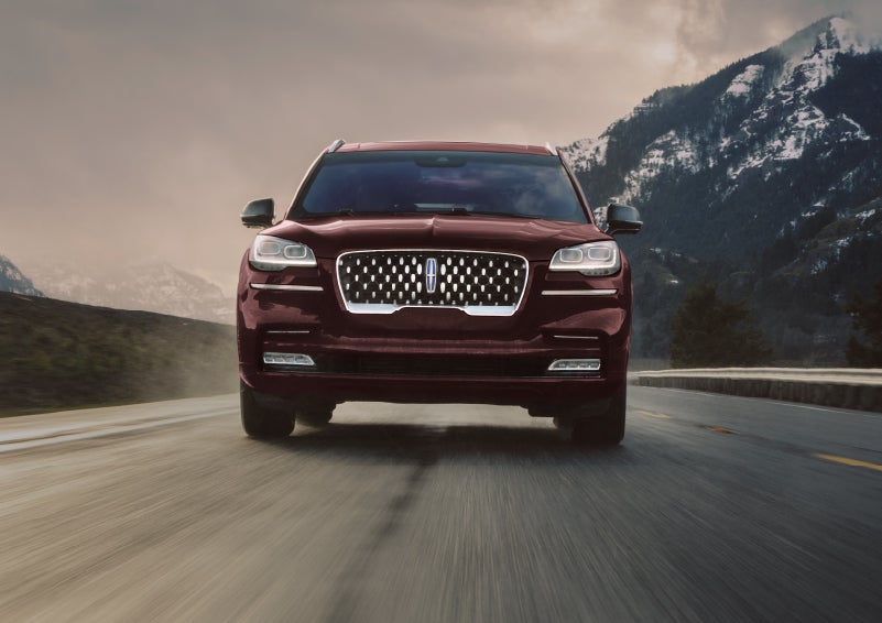 A 2024 Lincoln Aviator® SUV is shown in the Diamond Red exterior color. | Hooks Lincoln in Fort Worth TX