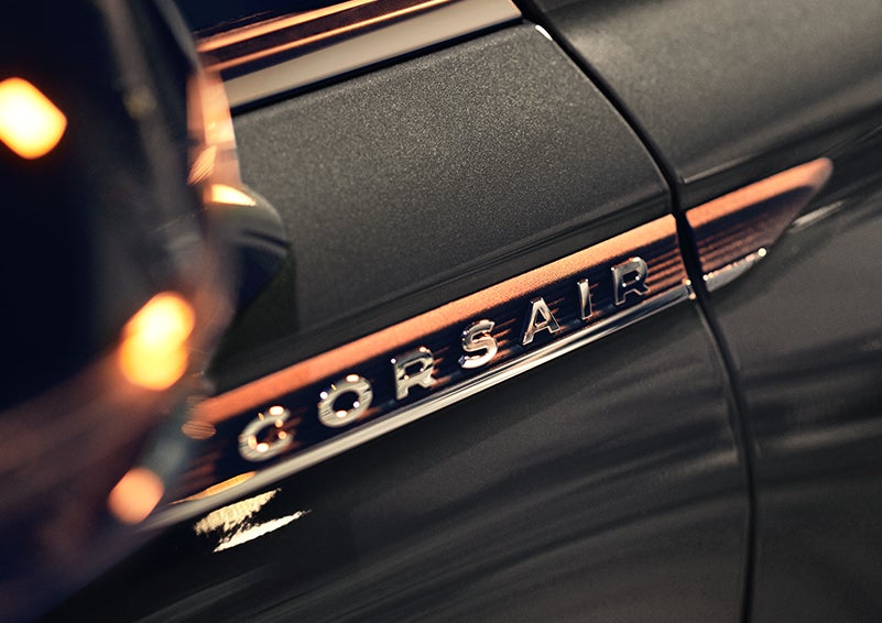 The stylish chrome badge reading “CORSAIR” is shown on the exterior of the vehicle. | Hooks Lincoln in Fort Worth TX