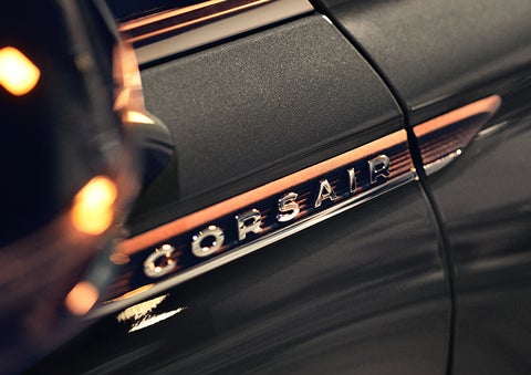 The stylish chrome badge reading “CORSAIR” is shown on the exterior of the vehicle. | Hooks Lincoln in Fort Worth TX