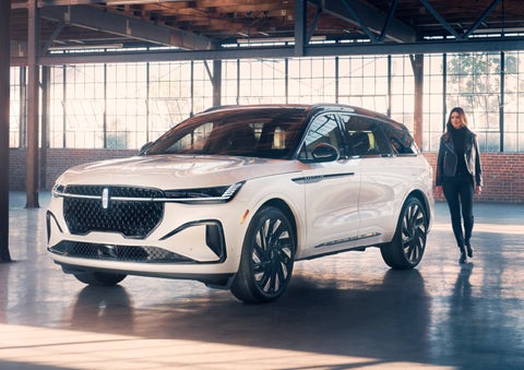 A person approaches a 2024 Lincoln Nautilus® SUV. | Hooks Lincoln in Fort Worth TX