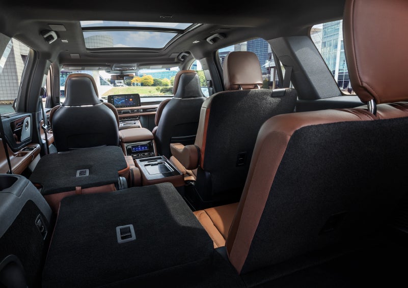 The interior of the 2025 Lincoln Aviator® SUV is shown with two seats folded down for added space. | Hooks Lincoln in Fort Worth TX