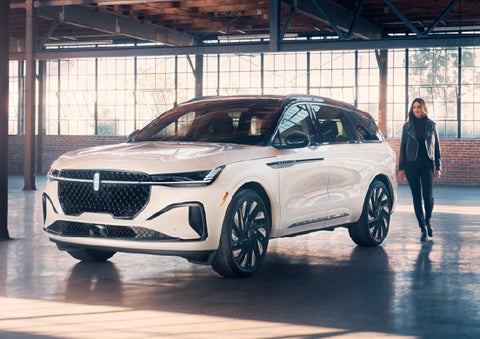 A person approaches a 2025 Lincoln Nautilus® SUV. | Hooks Lincoln in Fort Worth TX