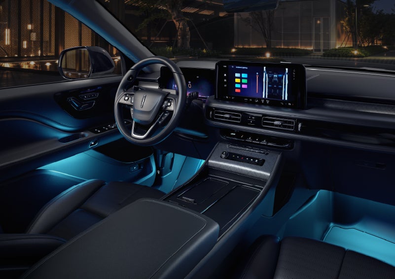 Deep blue ambient lighting glows from various places within a 2026 Lincoln Aviator® SUV. | Hooks Lincoln in Fort Worth TX