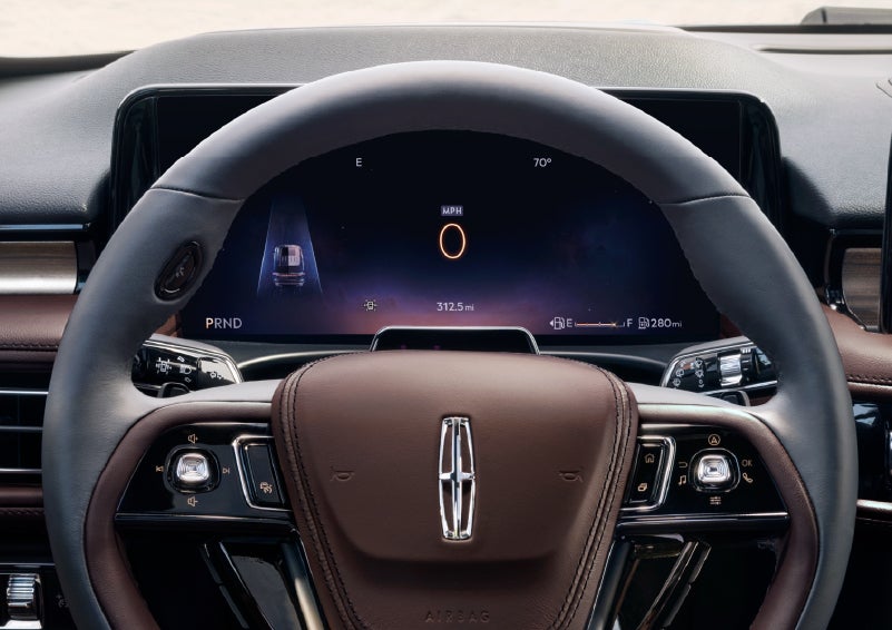 The driver’s information cluster display behind the steering wheel is shown. | Hooks Lincoln in Fort Worth TX