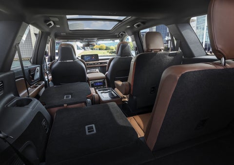 One side of the PowerFold® third-row seat and a second-row seat are folded forward in the 2026 Lincoln Aviator® SUV. | Hooks Lincoln in Fort Worth TX