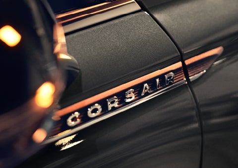 The stylish chrome badge reading “CORSAIR” is shown on the exterior of the vehicle. | Hooks Lincoln in Fort Worth TX