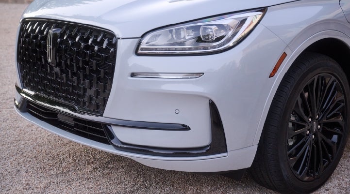 The all-black grille of the available Jet Appearance Package on a 2026 Lincoln Corsair® SUV is shown. | Hooks Lincoln in Fort Worth TX