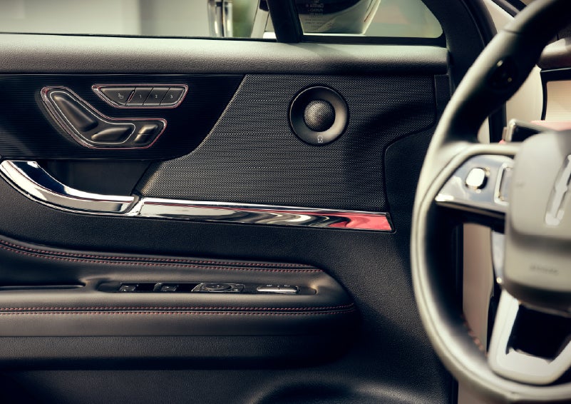 An audio speaker is shown in the driver's side door of a 2026 Lincoln Corsair® SUV | Hooks Lincoln in Fort Worth TX