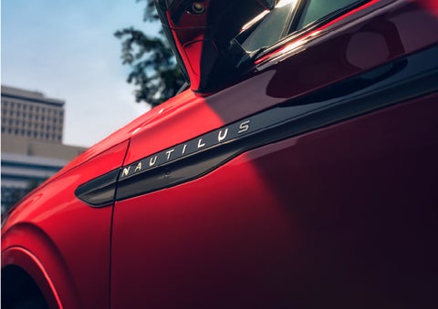 A side badge on the passenger door reads Nautilus. | Hooks Lincoln in Fort Worth TX