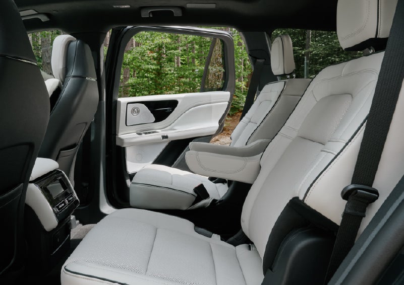 A side view of the second row with captain’s chairs in a 2027 Lincoln Aviator® Black Label™ SUV. | Hooks Lincoln in Fort Worth TX